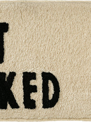 Close-up of the soft microfiber surface of Get Naked Graphic Bath Mat