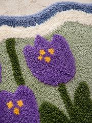 Close-up of the soft microfiber surface of Violet Tulip Frame Wavy-Edge Bath Mat & Runner Rug