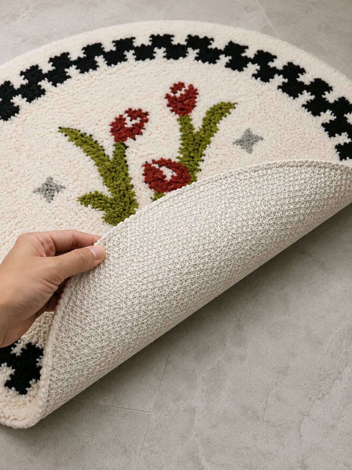 Close-up of the TPE backing of Heritage Tulip Round Bath Mat