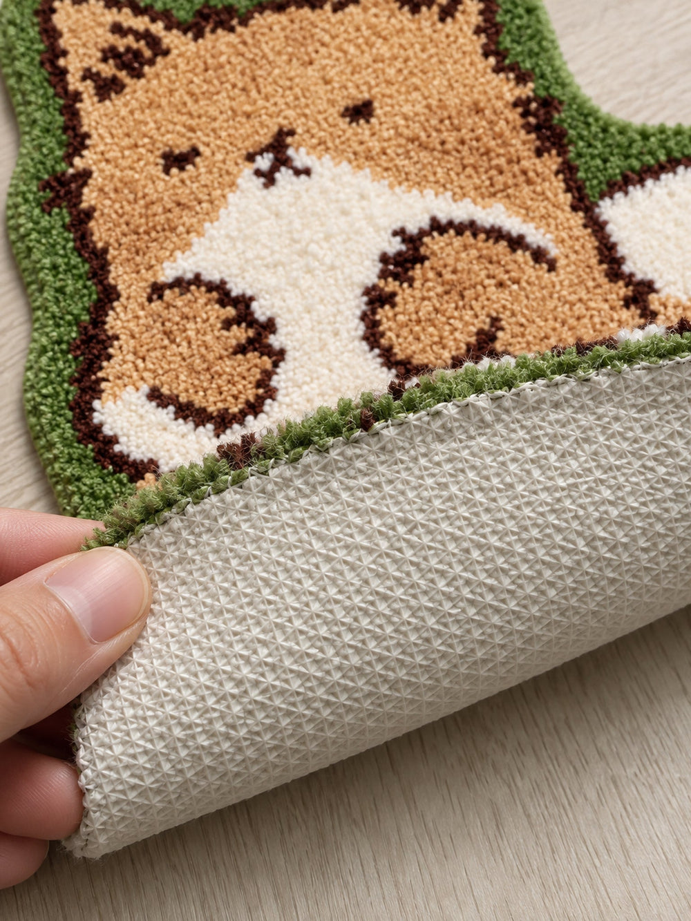 Close-up of the TPE backing of Cozy Tabby Cat Shaped Bath Mat