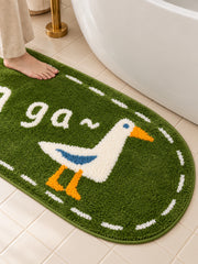 Goose Talk Green Oval Bath Mat & Runner Rug on a bathroom floor, shown from another angle