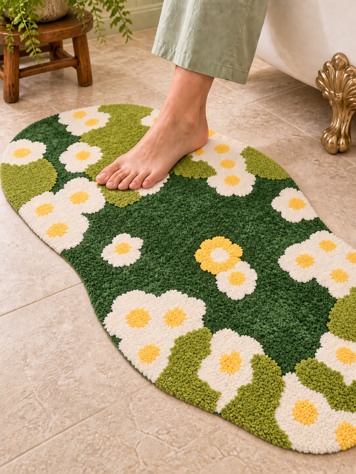 Daisy Meadow Floral Bath Mat & Runner Rug - Green on a bathroom floor, shown from another angle