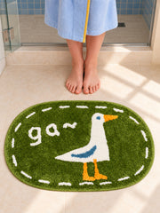 Goose Talk Green Oval Bath Mat — Bathroom close-up