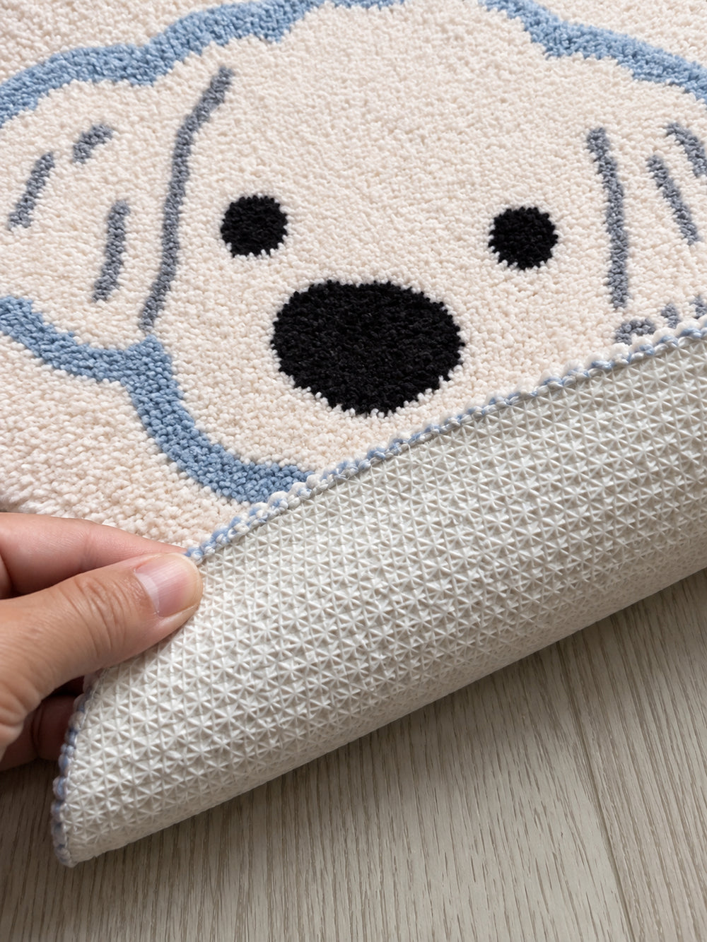 Snowy Puppy Face Shaped Bath Mat — backing detail