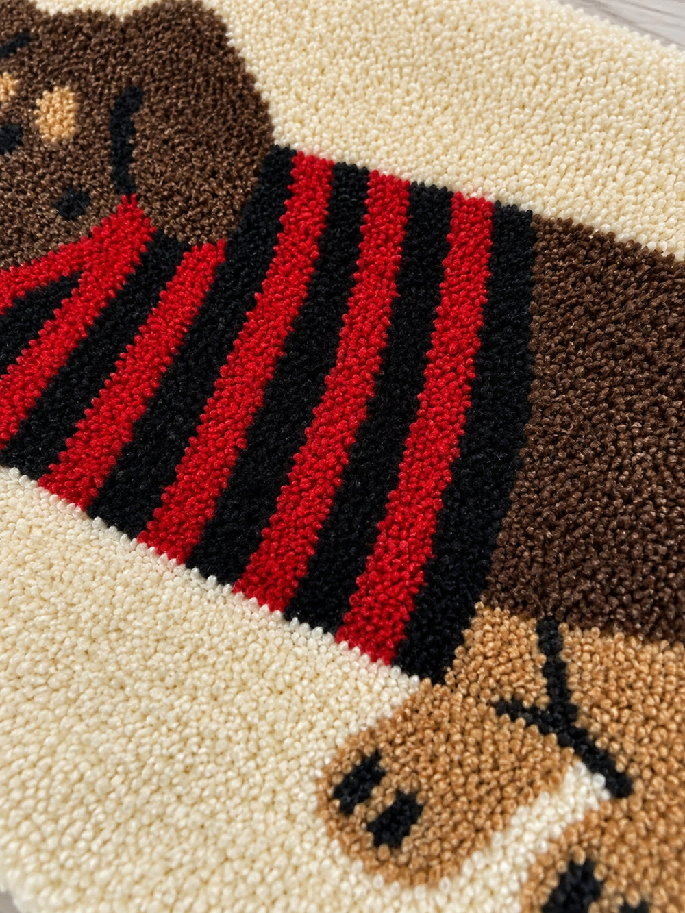 Striped Dachshund Bath Mat - Red & Black — surface detail
