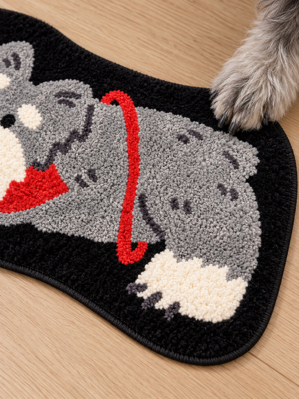 Red-Scarf Schnauzer Shaped Bath Mat — surface detail