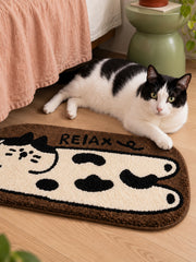 Relaxed Spotted Cat Bath Mat — bedside context detail
