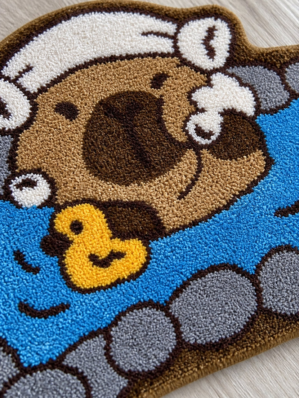 Capybara Hot Spring Shaped Bath Mat — surface detail