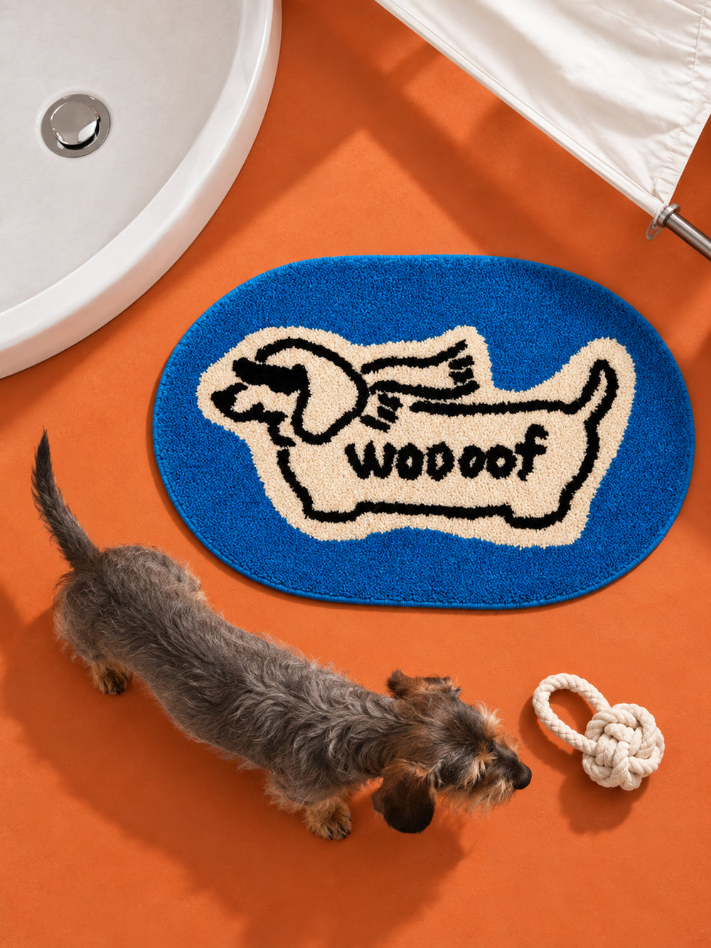 Blue Woof Hound Oval Bath Mat — bathroom scene