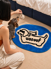 Blue Woof Hound Oval Bath Mat — bedside context detail