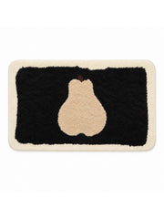 Midnight Pear Silhouette Bath Mat on a white background