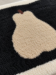 Midnight Pear Silhouette Bath Mat — surface detail