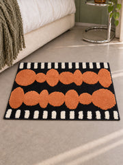 Electric Blue Pebbles Retro Bath Mat — bedside context detail