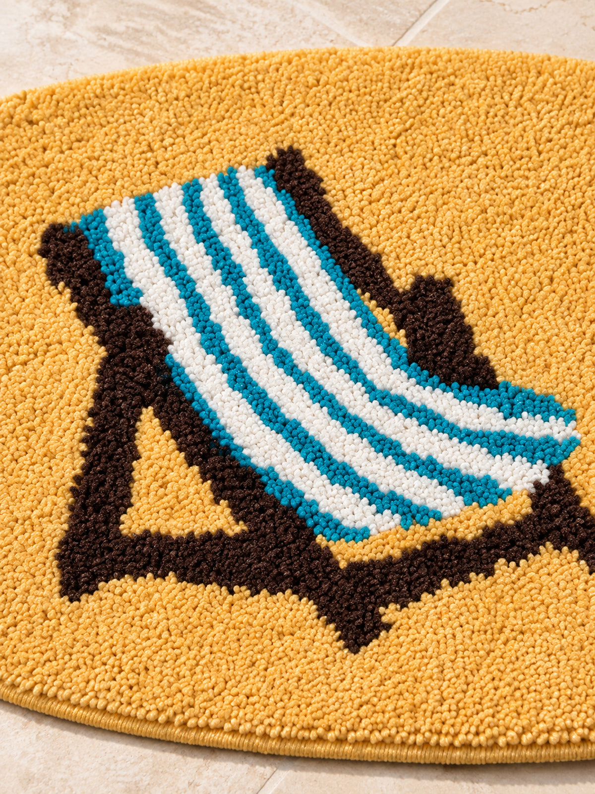 All Day Off Graphic Bath Mat - Blue — woven chair detail