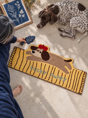Lucky Puppy Lounger Striped Runner Rug — bedside context detail