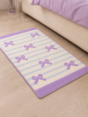 Ribbon Stripe Bow Bath Mat - Lavender — bedside context detail