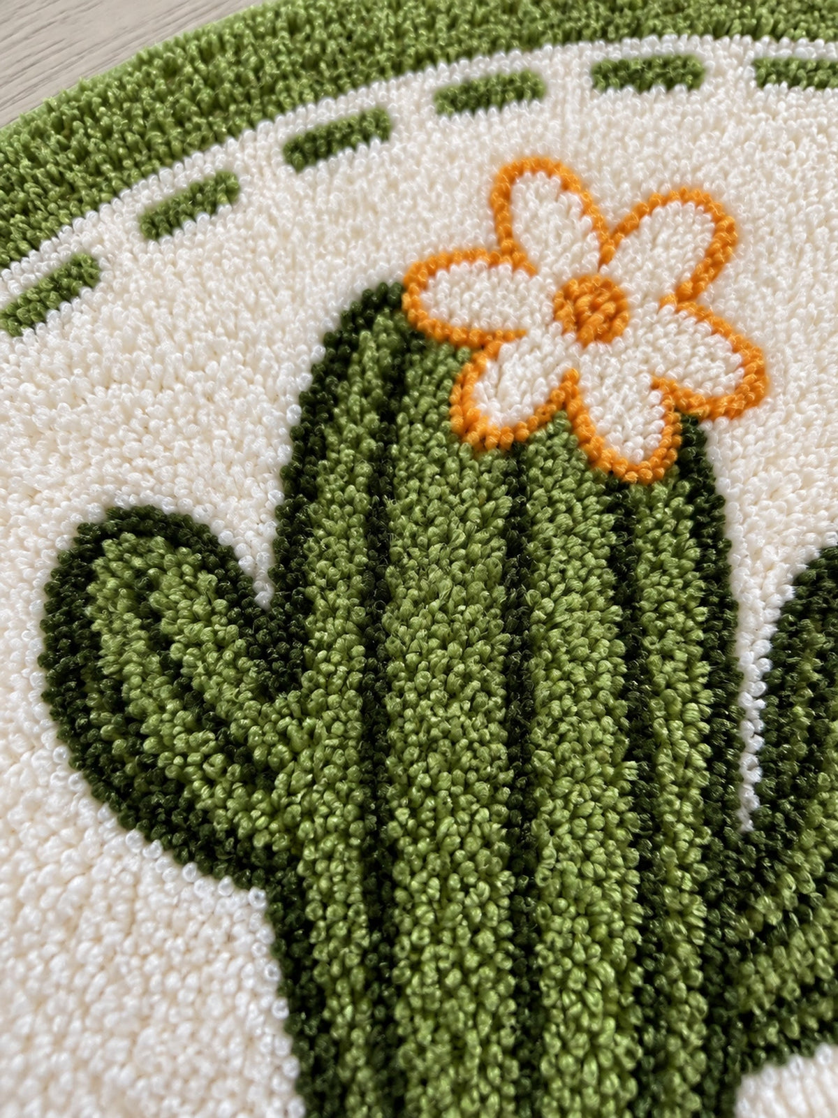 Blooming Cactus Arched Bath Mat — surface detail