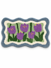 Violet tulip mat with a blue wavy border, 40 x 60 cm, on a white background.