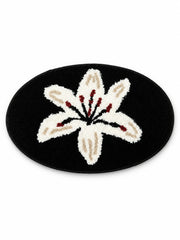 Midnight Lily Oval Bath Mat on a white background