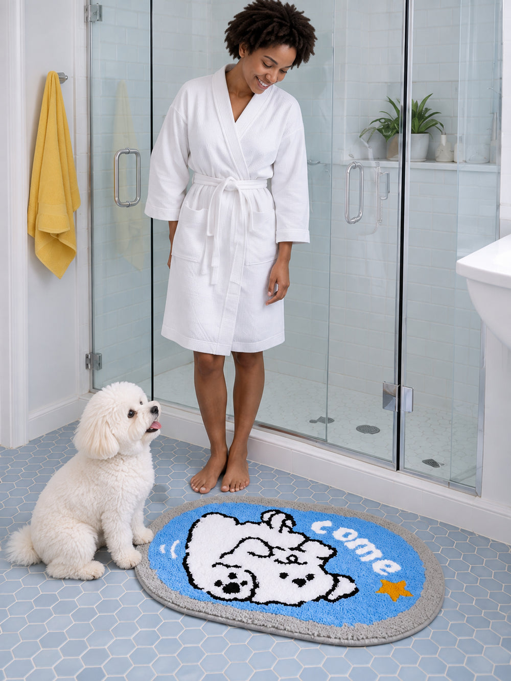 Come Along Puppy Oval Bath Mat on a bathroom floor