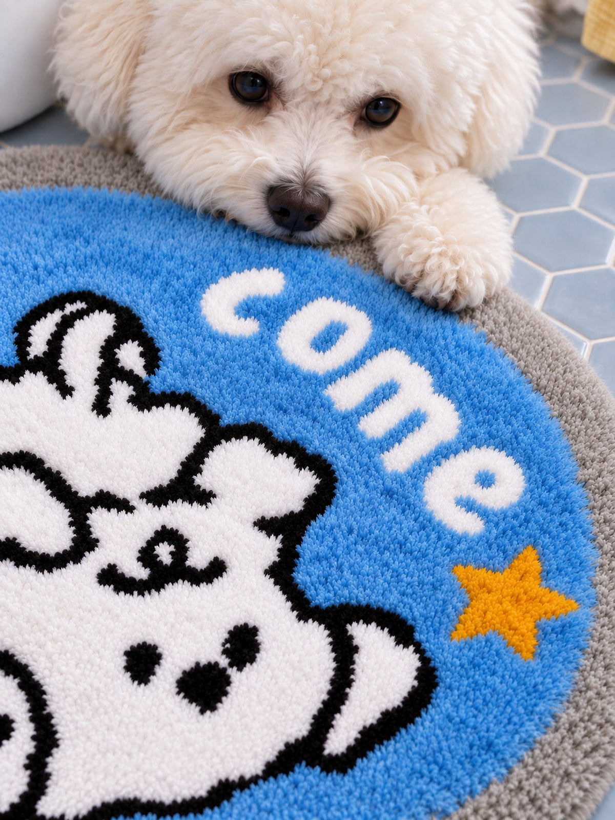 Close-up of the soft microfiber surface of Come Along Puppy Oval Bath Mat