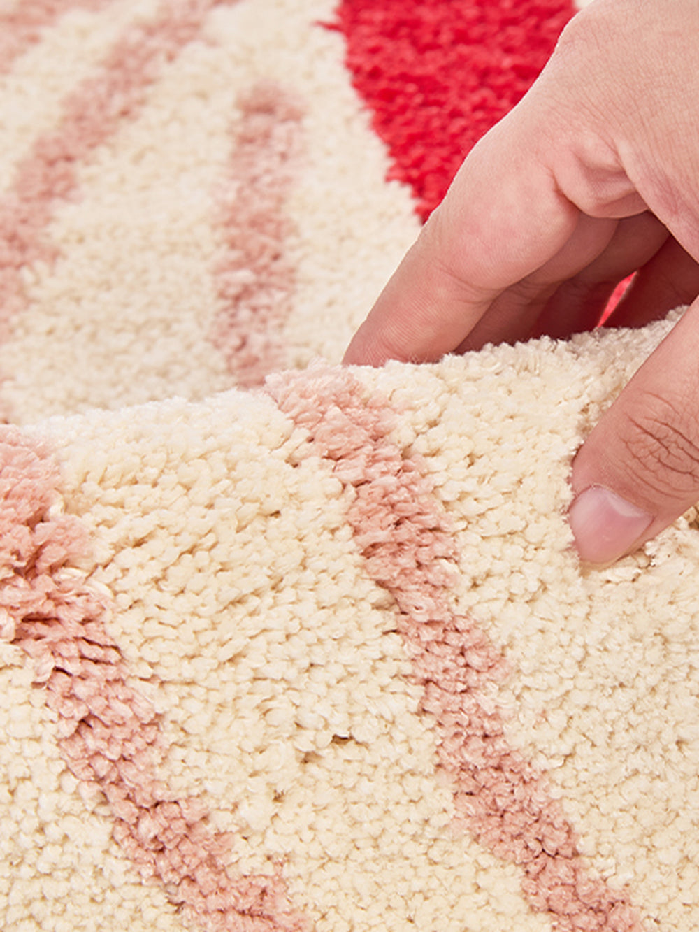 Close-up of the soft microfiber surface of Blush Veined Leaf Bath Mat