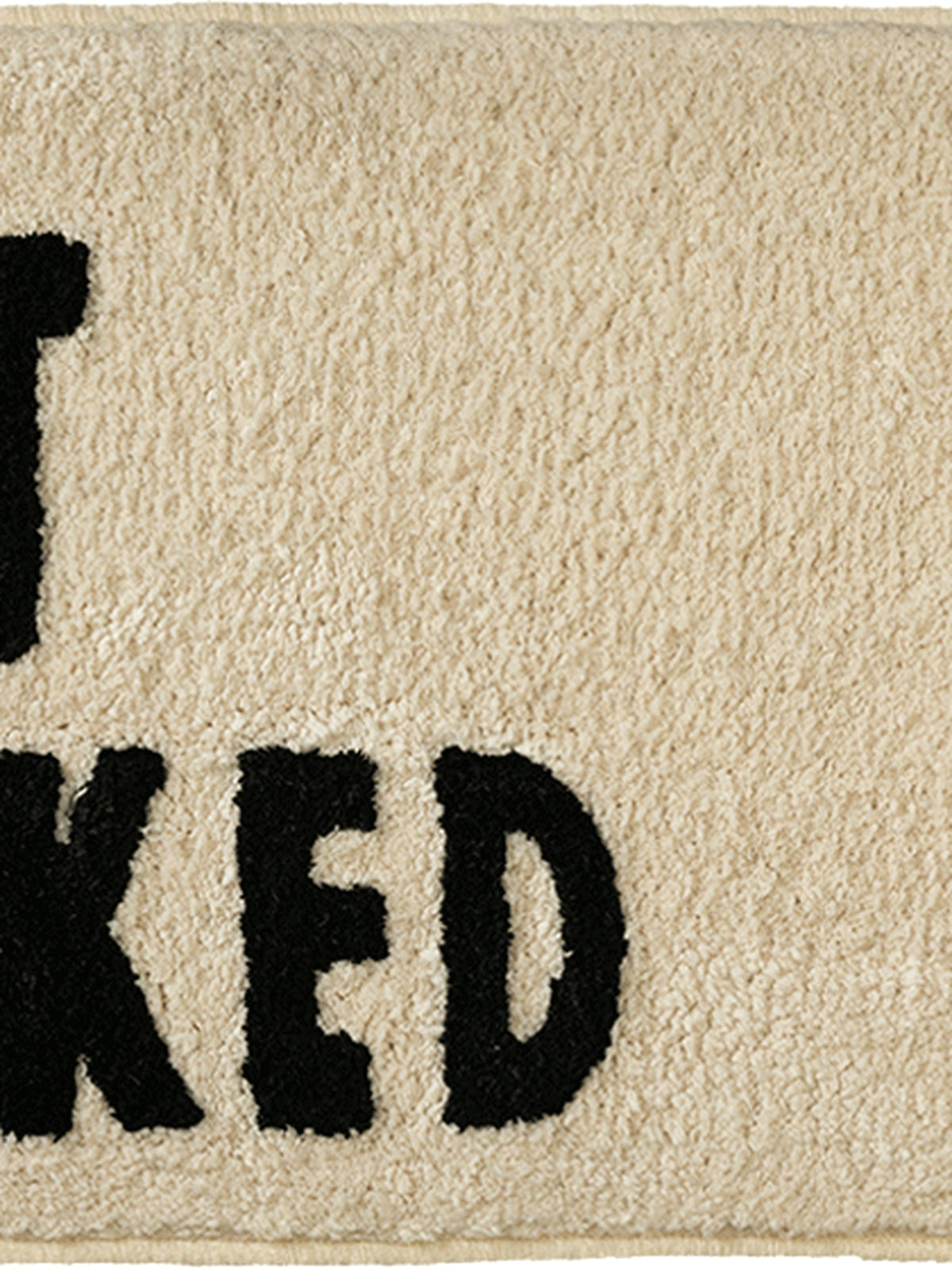 Close-up of the soft microfiber surface of Get Naked Graphic Bath Mat