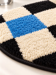Close-up of the soft microfiber surface of Color Pop Wavy Checkerboard Bath Mat