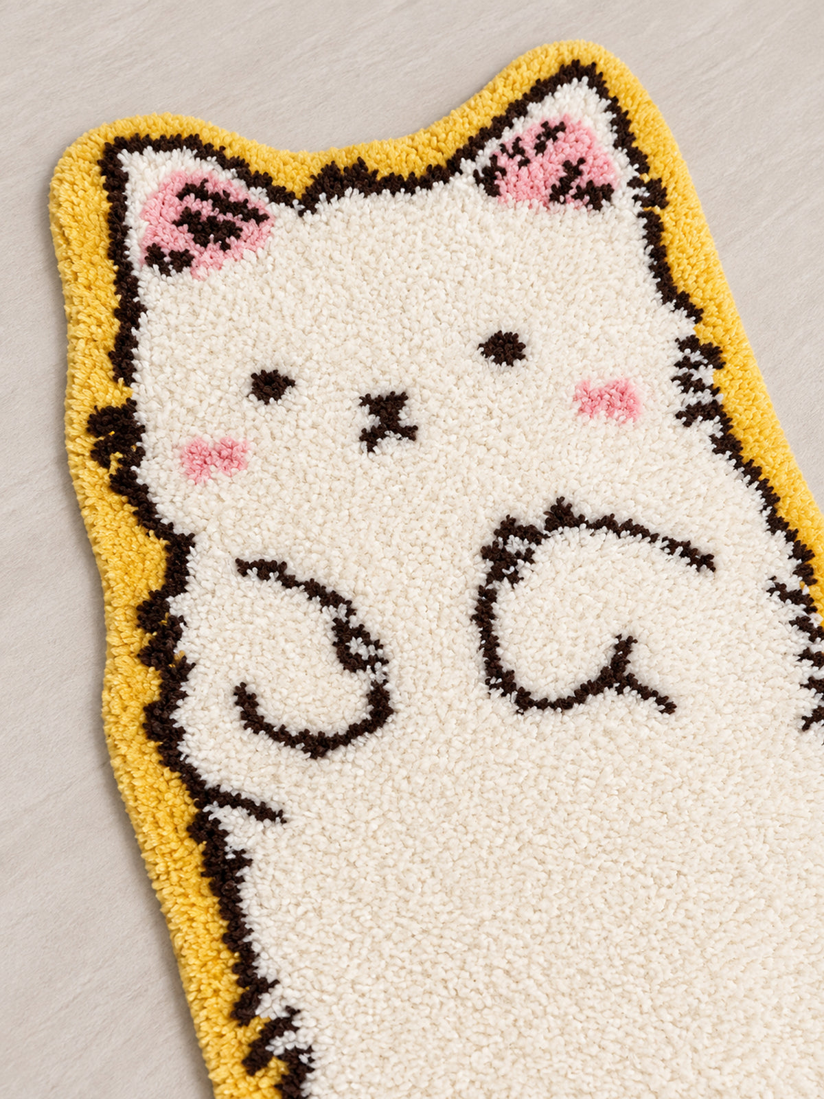Close-up of the soft microfiber surface of Long Cat Shaped Runner Rug - Ivory