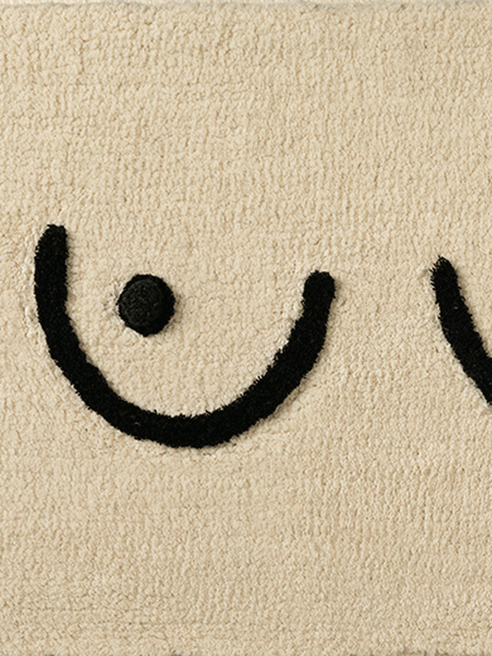 Close-up of the soft microfiber surface of Minimal Curves Line-Art Bath Mat