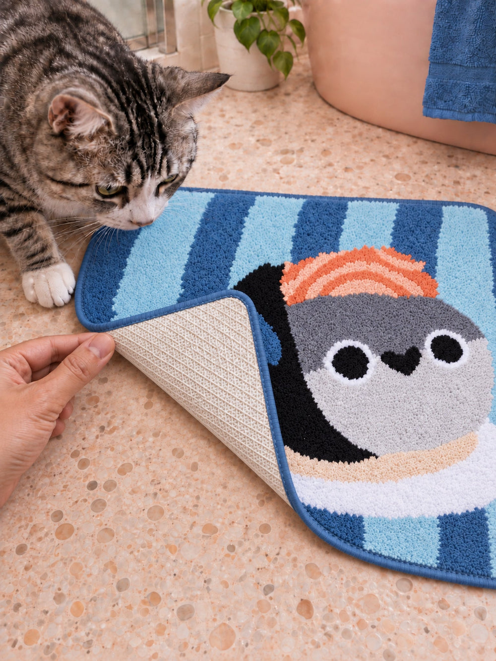 Close-up of the TPE backing of Sushi Fish Blue Stripe Bath Mat