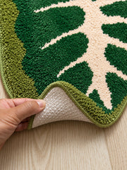Close-up of the TPE backing of Alocasia Leaf Tropical Green Bath Mat