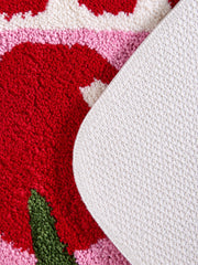 Close-up of the TPE backing of Retro Cherry Graphic Bath Mat - Pink