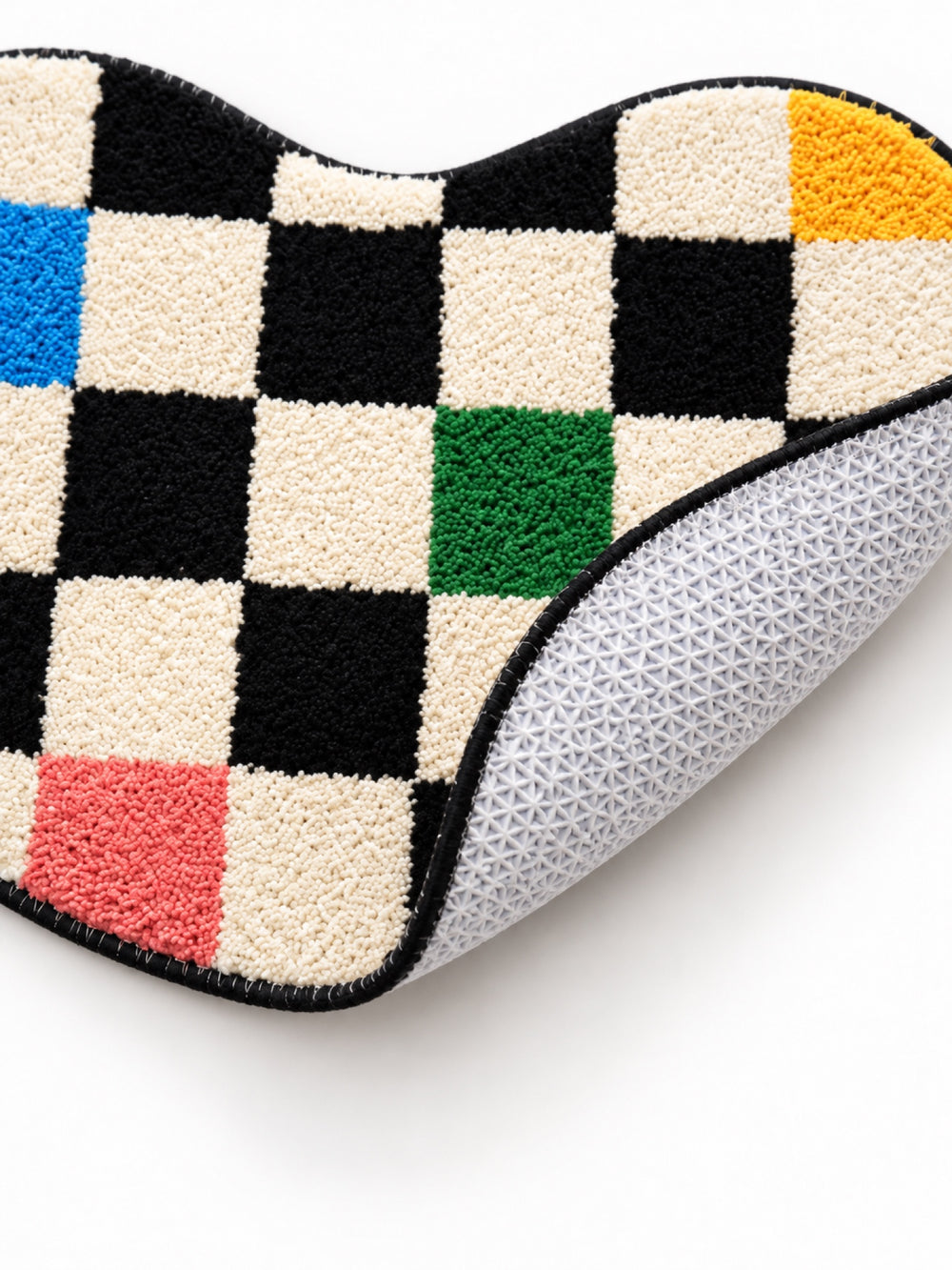 Close-up of the TPE backing of Color Pop Wavy Checkerboard Bath Mat