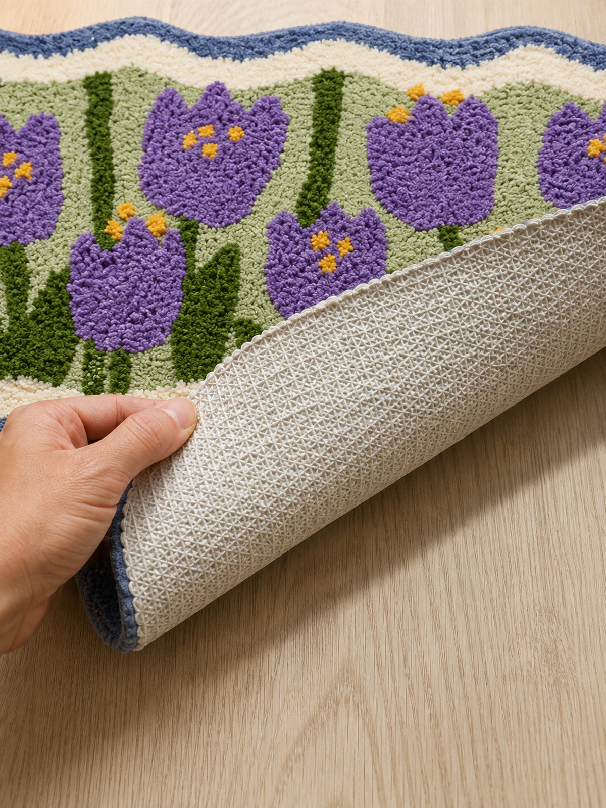 Close-up of the TPE backing of Violet Tulip Frame Wavy-Edge Bath Mat & Runner Rug