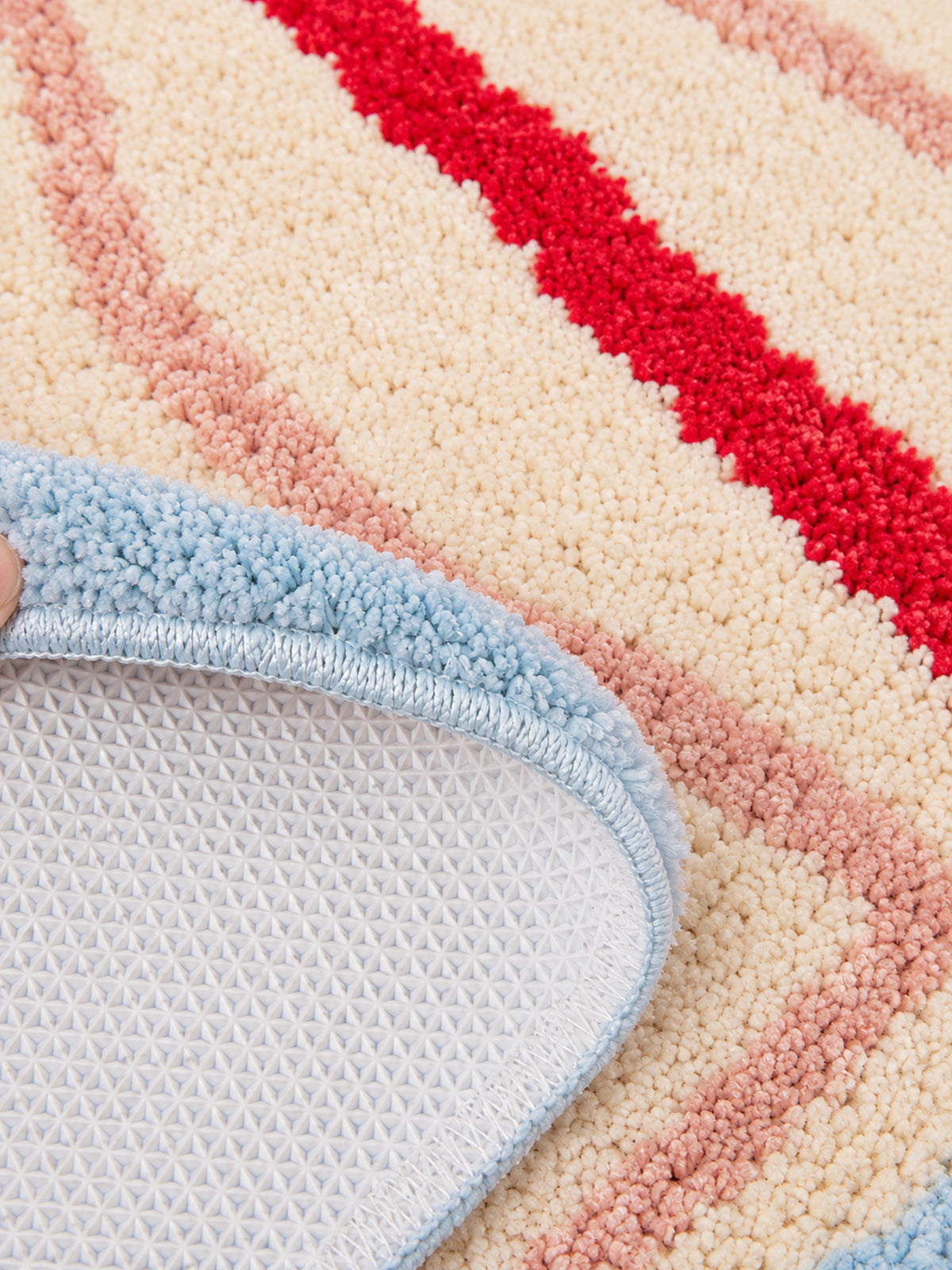 Close-up of the TPE backing of Blush Veined Leaf Bath Mat
