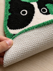 Close-up of the TPE backing of Black & White Puppy Shaped Bath Mat