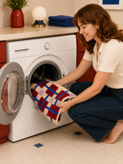 Crimson Grid Colorblock Bath Mat being machine washed