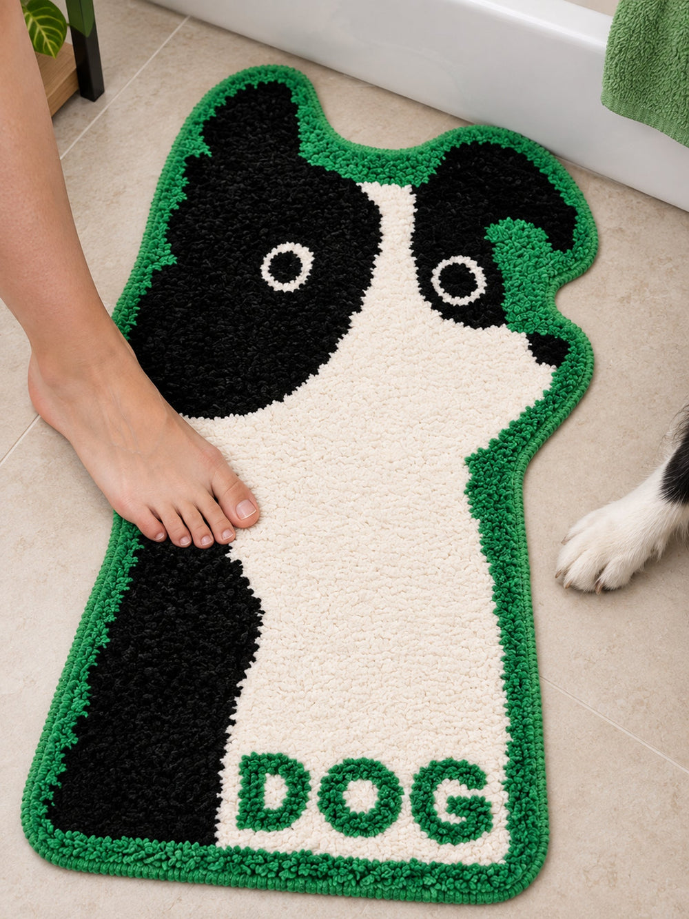 Black & White Puppy Shaped Bath Mat on a bathroom floor, shown from another angle