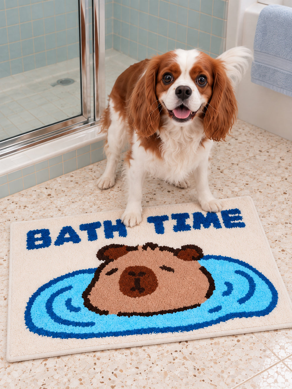Capybara Bath Time Graphic Bath Mat on a bathroom floor, shown from another angle