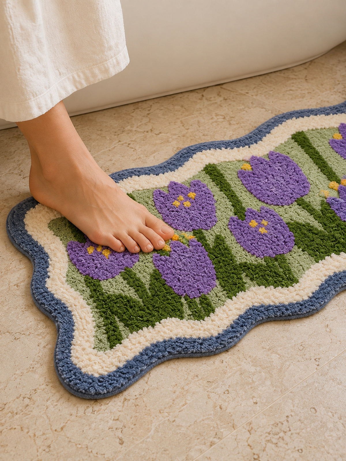 Violet Tulip Frame Wavy-Edge Bath Mat & Runner Rug on a bathroom floor, shown from another angle
