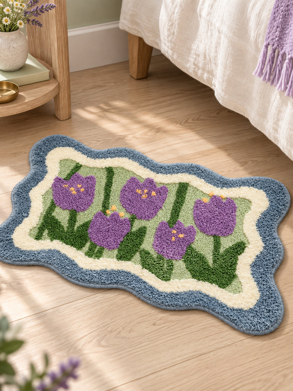 Violet Tulip Frame Wavy-Edge Bath Mat — Bedside close-up