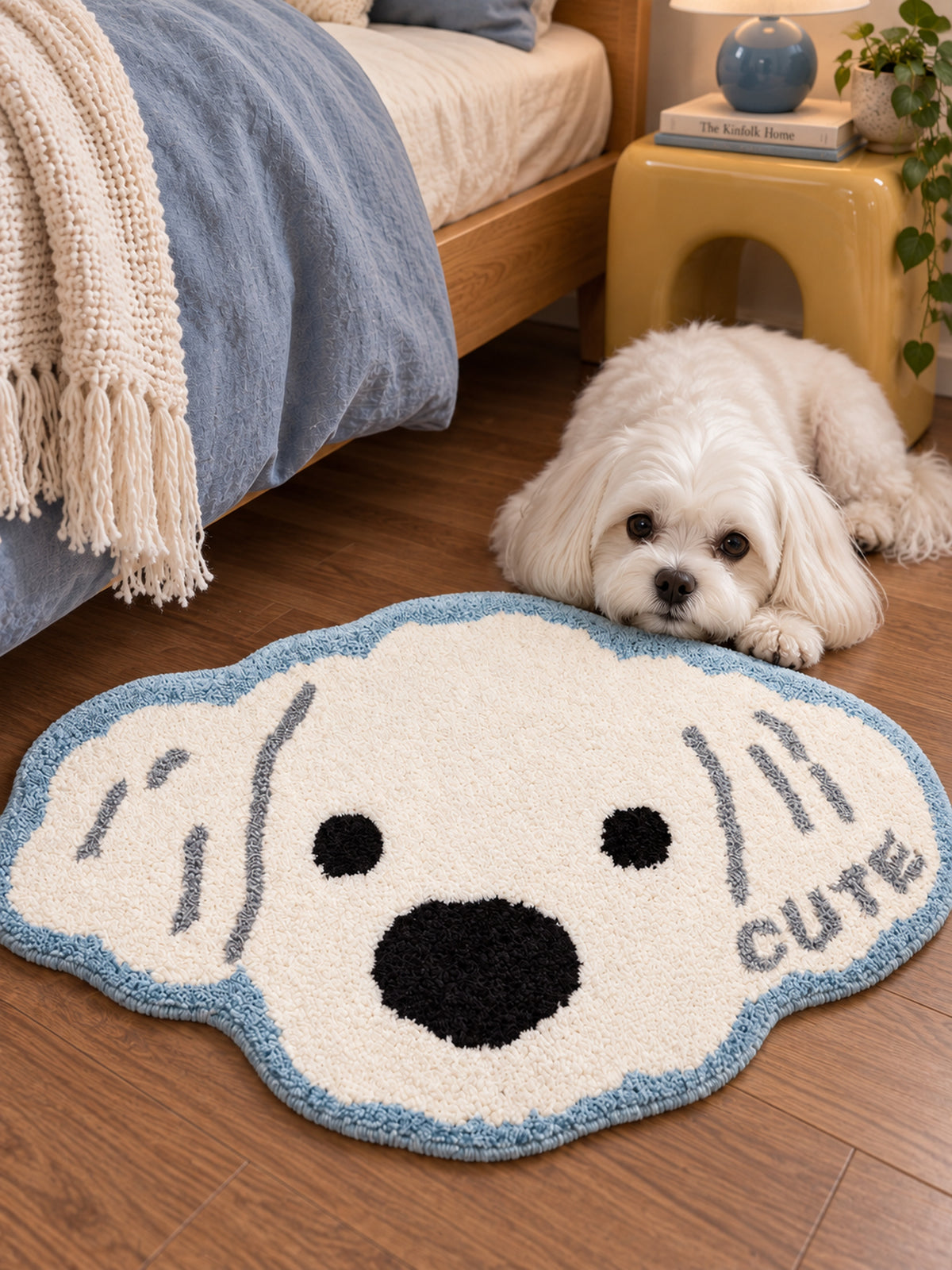 Snowy Puppy Face Shaped Bath Mat — bedside context detail