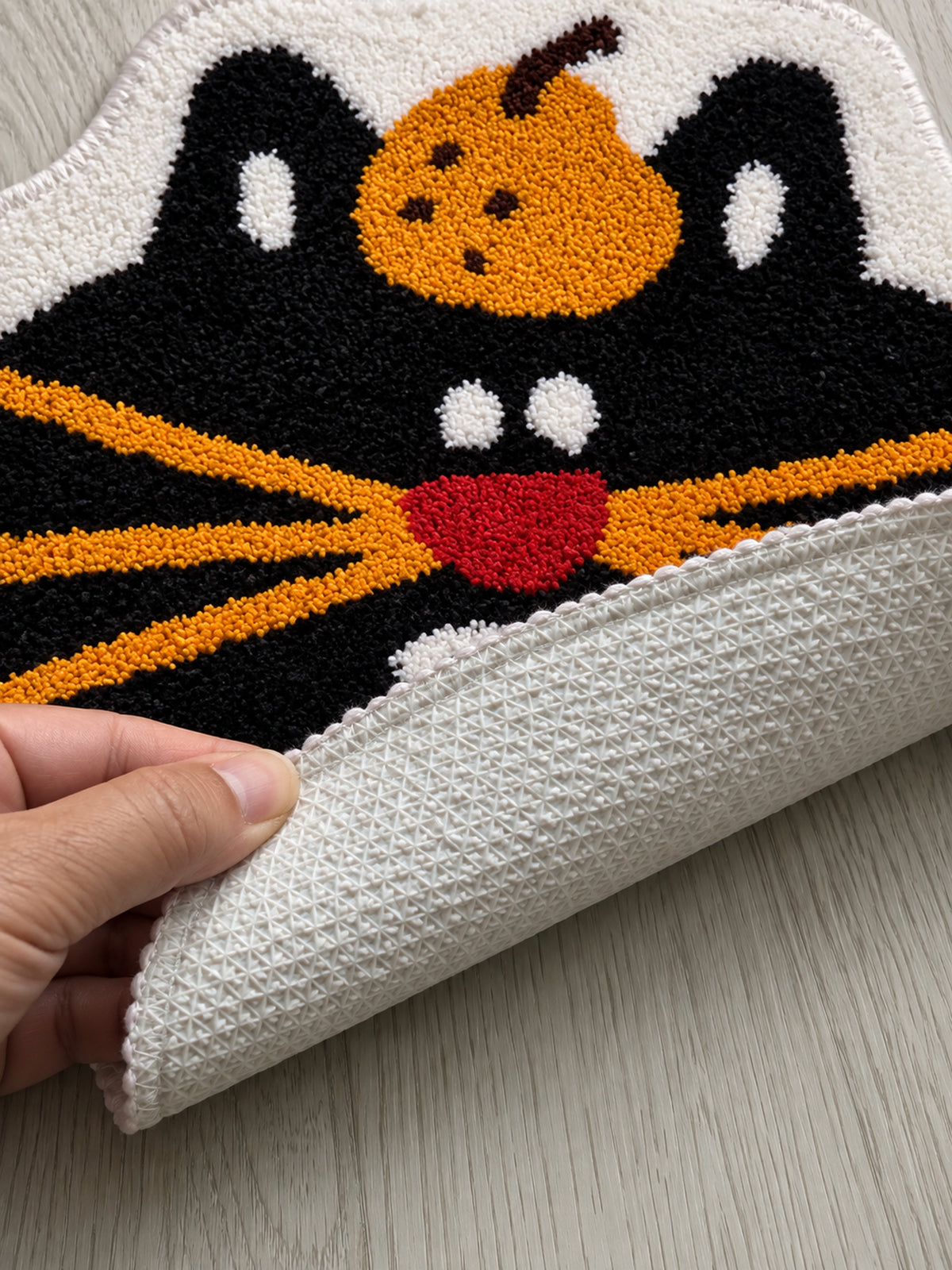 Pumpkin Black Cat Face Bath Mat — backing detail