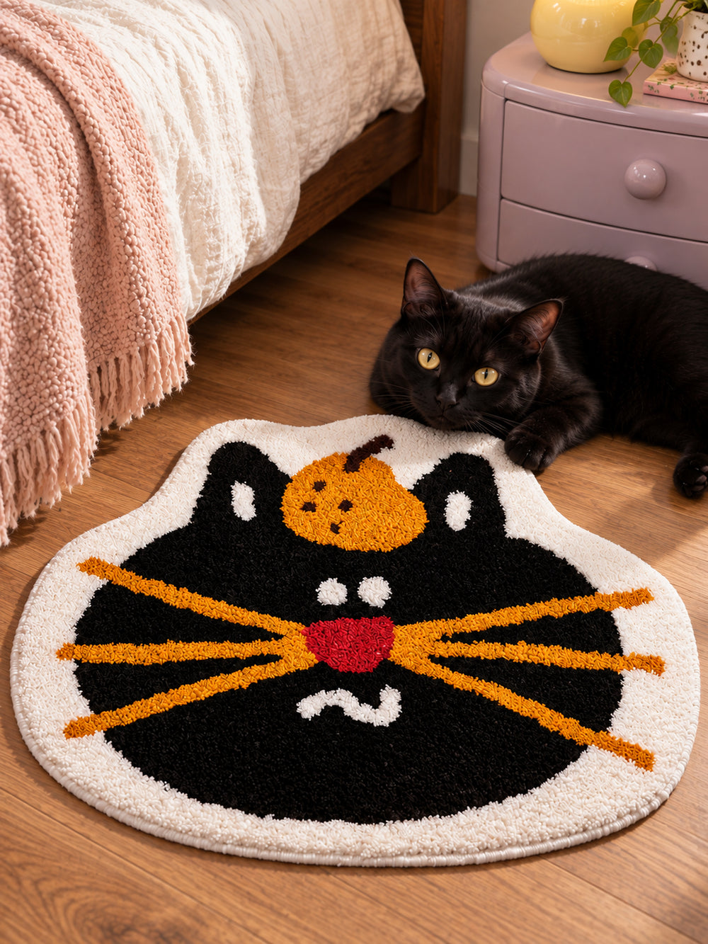 Pumpkin Black Cat Face Bath Mat — bedside context detail
