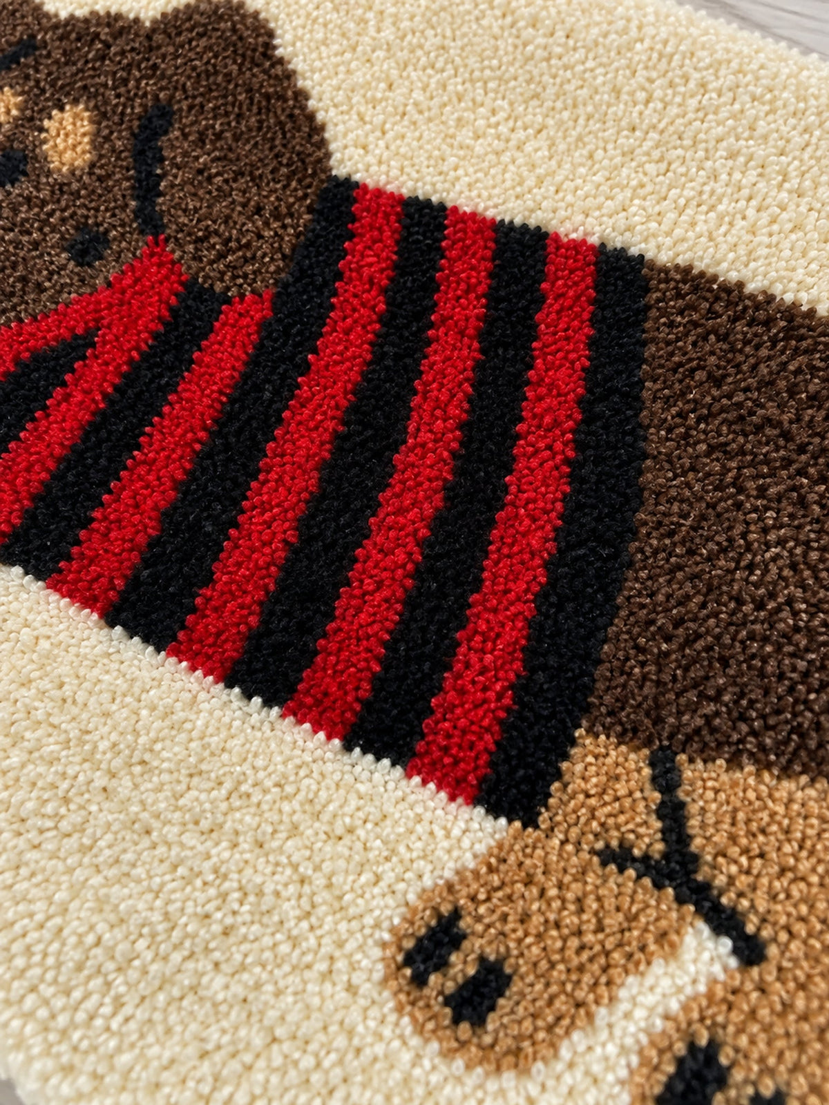 Striped Dachshund Bath Mat - Red & Black — surface detail