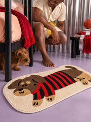 Striped Dachshund Bath Mat - Red & Black — bedside context detail