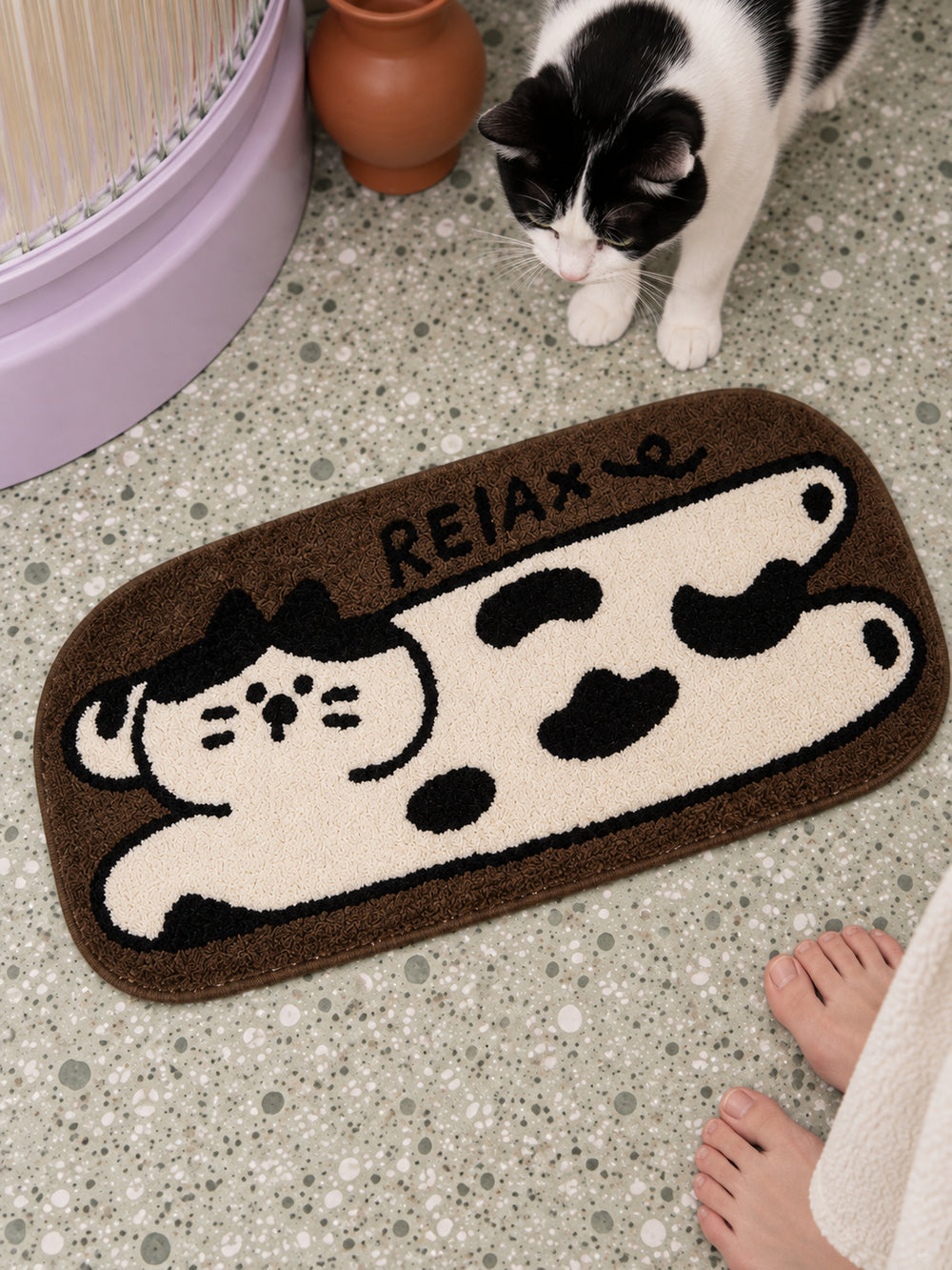 Relaxed Spotted Cat Bath Mat — bathroom context detail