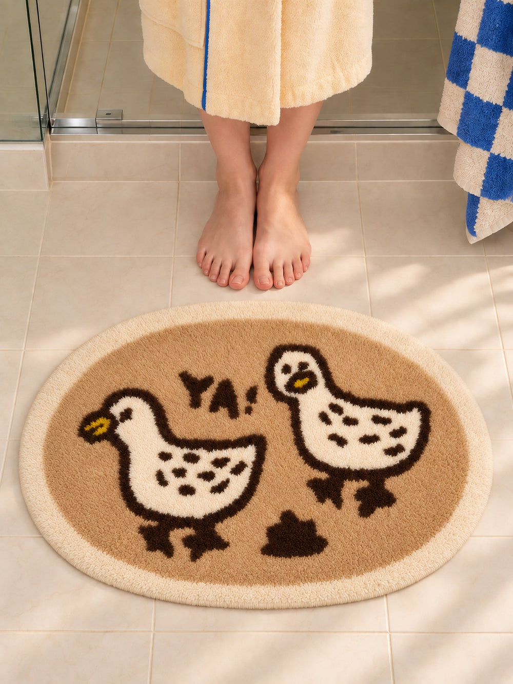 Cheerful Duck Duo Oval Bath Mat — Bathroom close-up