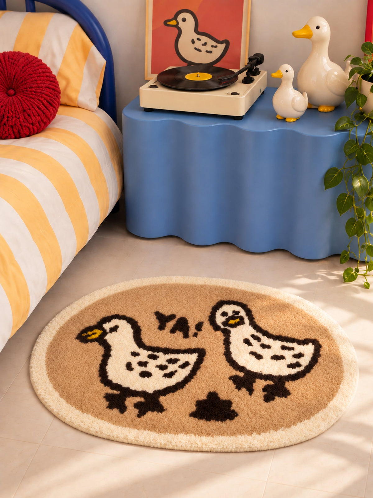 Cheerful Duck Duo Oval Bath Mat — Bedside close-up